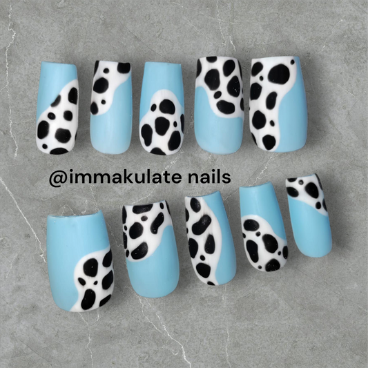 partial cow print nails