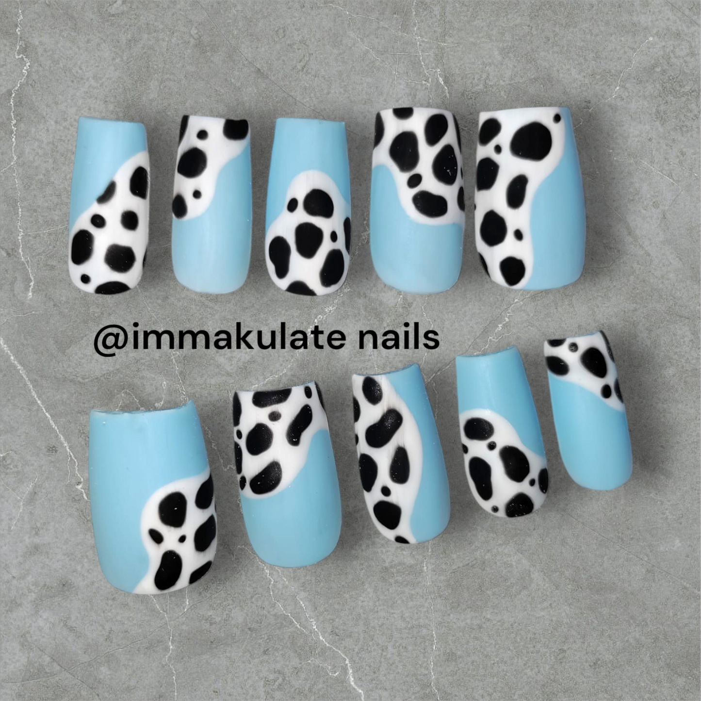 partial cow print nails