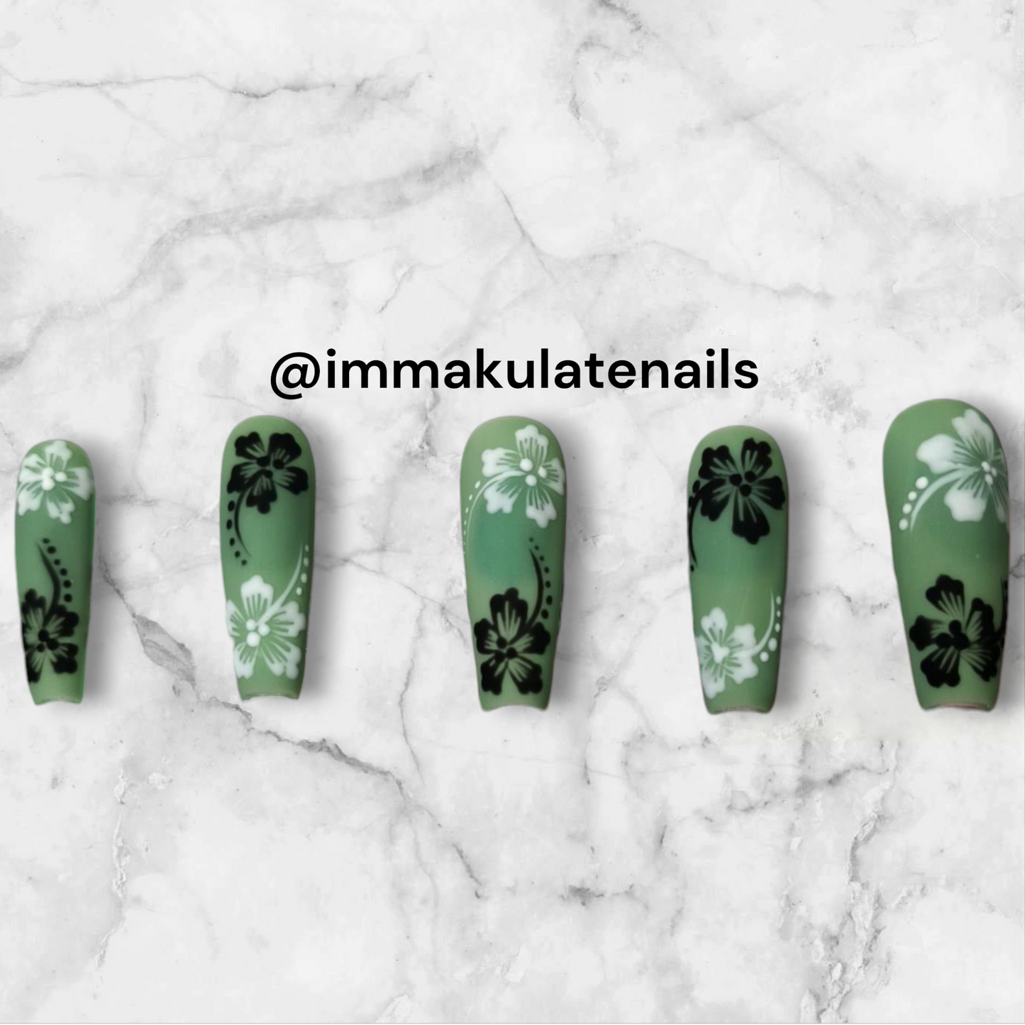 black and white hibiscus flower nails