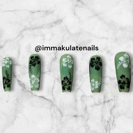 black and white hibiscus flower nails